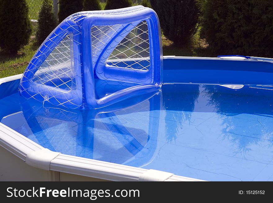 Garden pool with water polo goal.