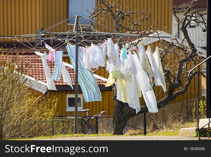 The linen after washing dries in a court yard. Taken near Oslo, Norway. The linen after washing dries in a court yard. Taken near Oslo, Norway.