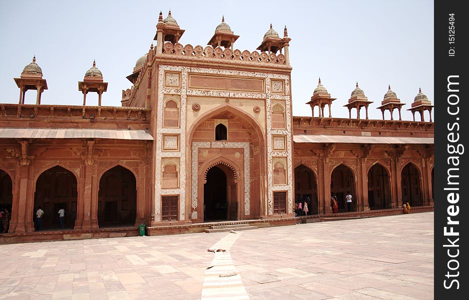 The Badshahi Gate was built during the reign of Mughal emperor Akbar. The Badshahi Gate was built during the reign of Mughal emperor Akbar.