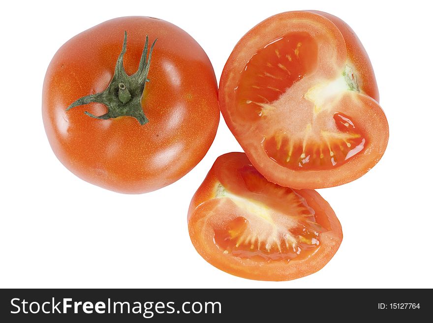 Two tomatoes whole and cut on white background