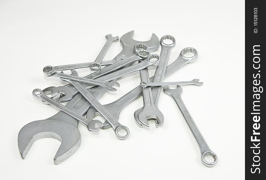 A couple of combined open-end wrench and ring wrenches