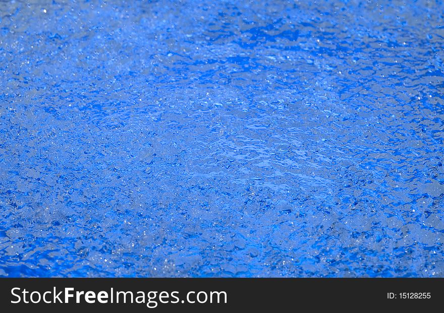 Blue background with raindrop. Ripple water. Blue background with raindrop. Ripple water