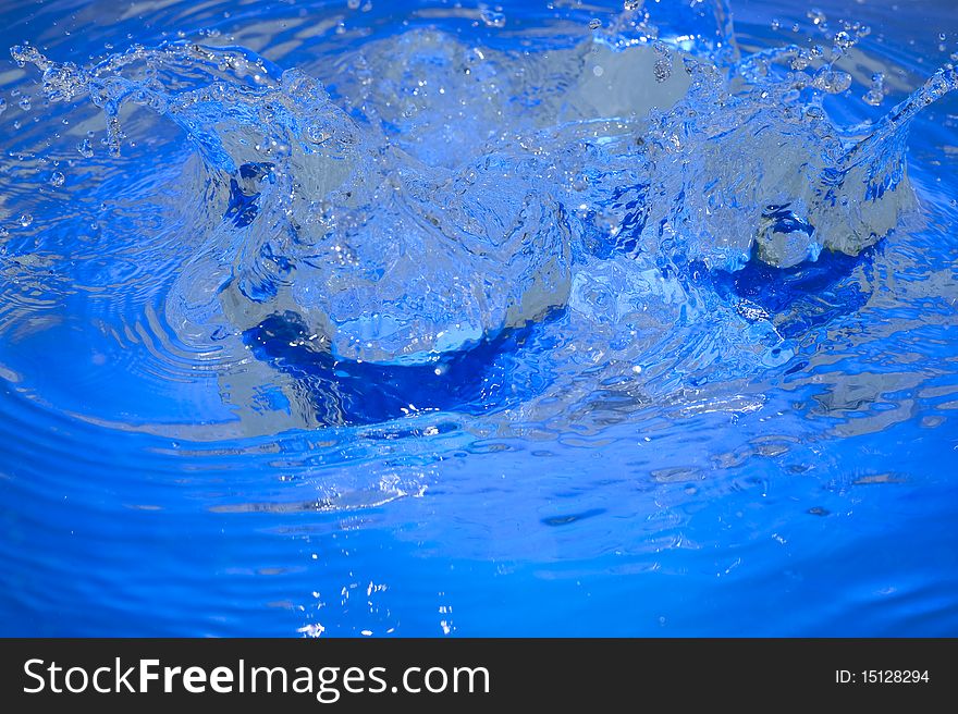 Blue background with raindrop. Ripple water. Blue background with raindrop. Ripple water