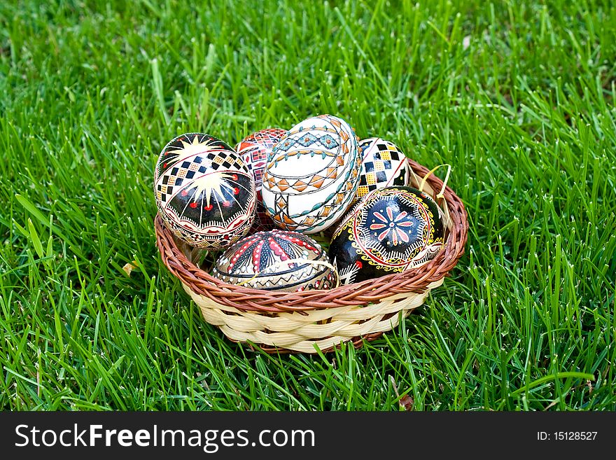 Beautifully colored easter eggs in a basket