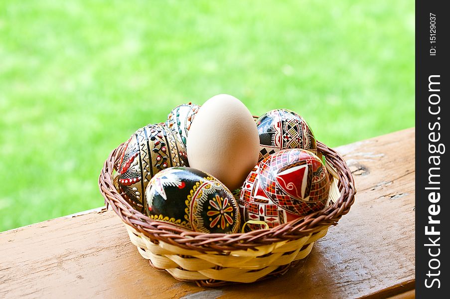 Beautifully colored easter eggs in a basket