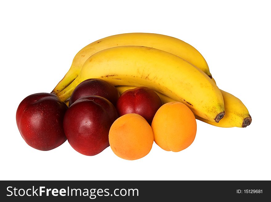 Bananas, nectarines and apricots isolated on white background