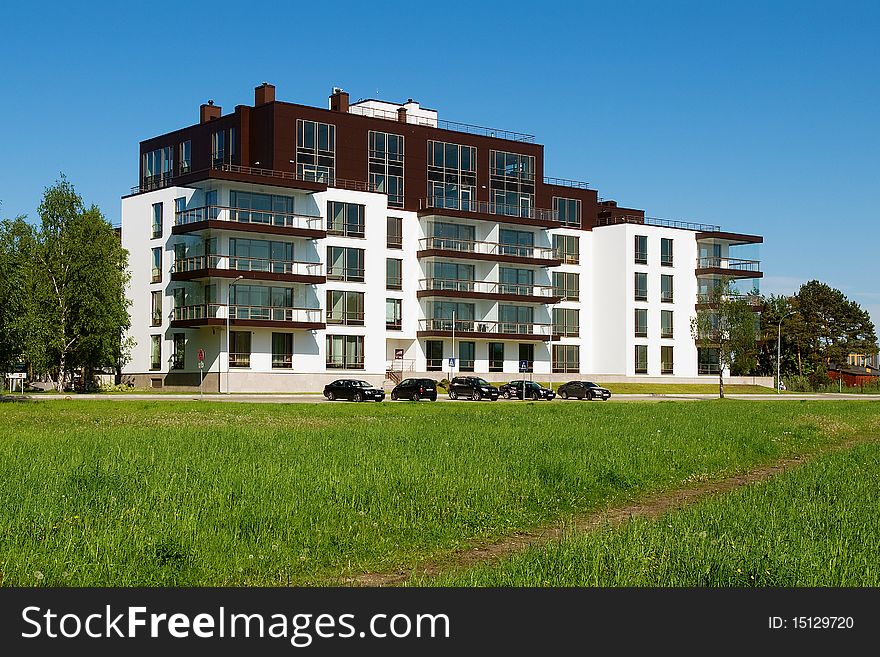 New building on green lawn