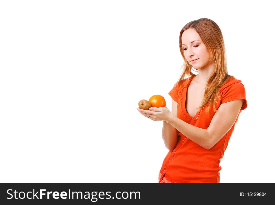Picture of a young pretty girl in dress which holds orange and kiwi. Isolated on white. Picture of a young pretty girl in dress which holds orange and kiwi. Isolated on white.