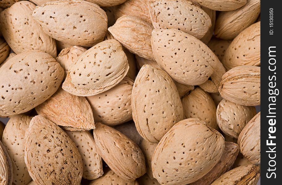 Close up shot of a background of almonds. Close up shot of a background of almonds.