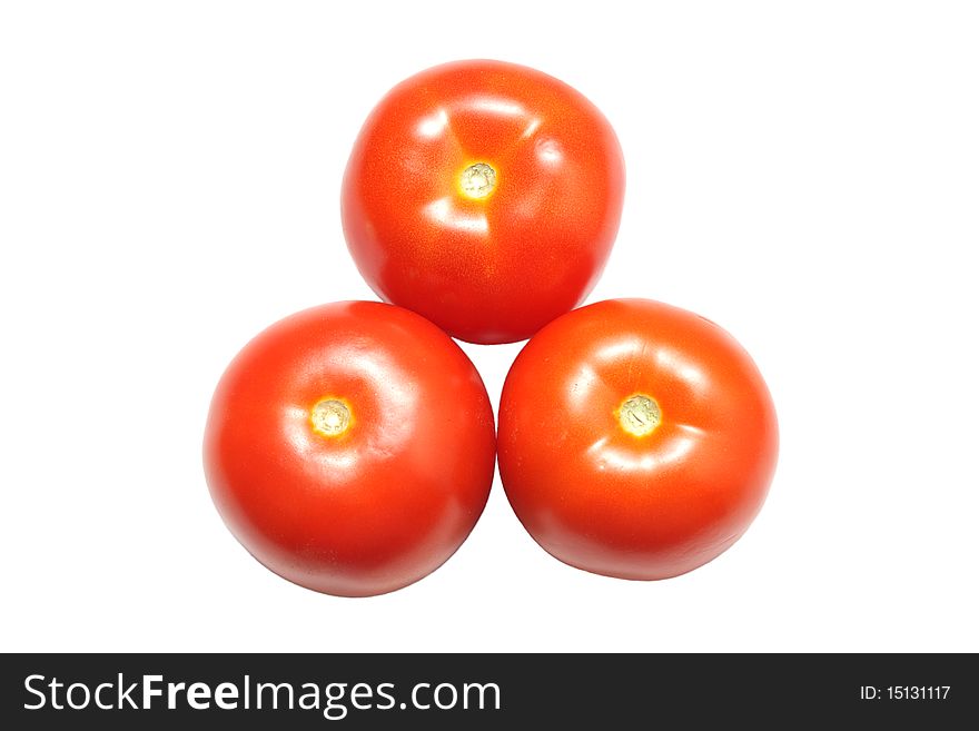 Three red tomatoes isolated on white