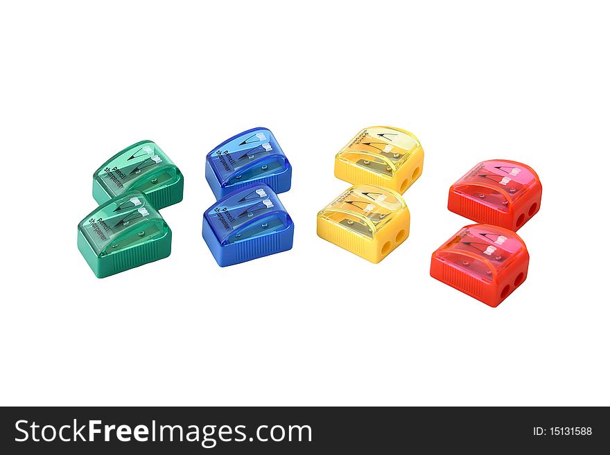 Group of pencil-sharpeners in a lot of colors isolated on white background.