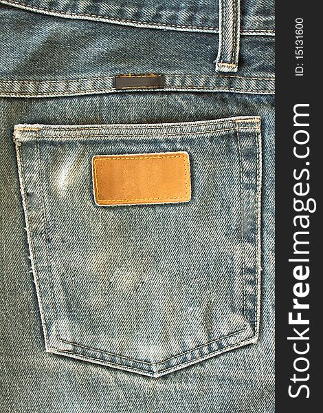 Fragment of modern jeans with pocket, can be used as a background. Fragment of modern jeans with pocket, can be used as a background