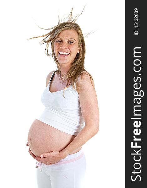 Young fresh pregnant woman isolated over white background. Young fresh pregnant woman isolated over white background.