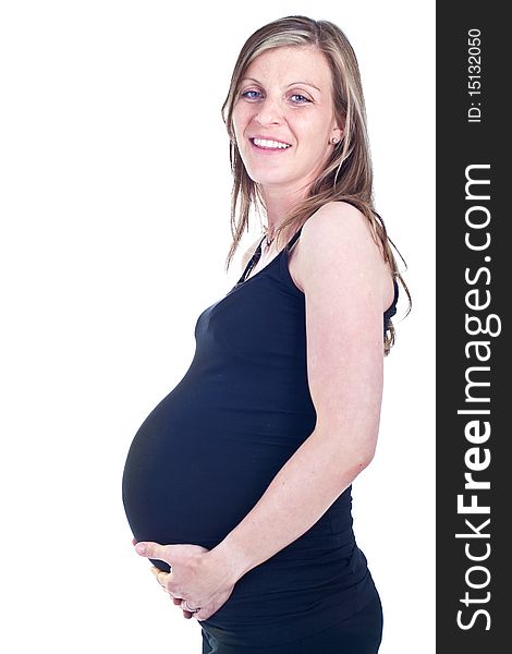 Young beautiful pregnant woman isolated over white background. Young beautiful pregnant woman isolated over white background.