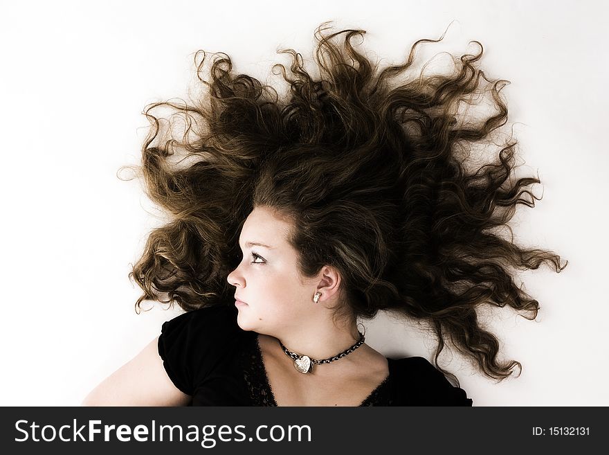 Romantic woman with spread hair