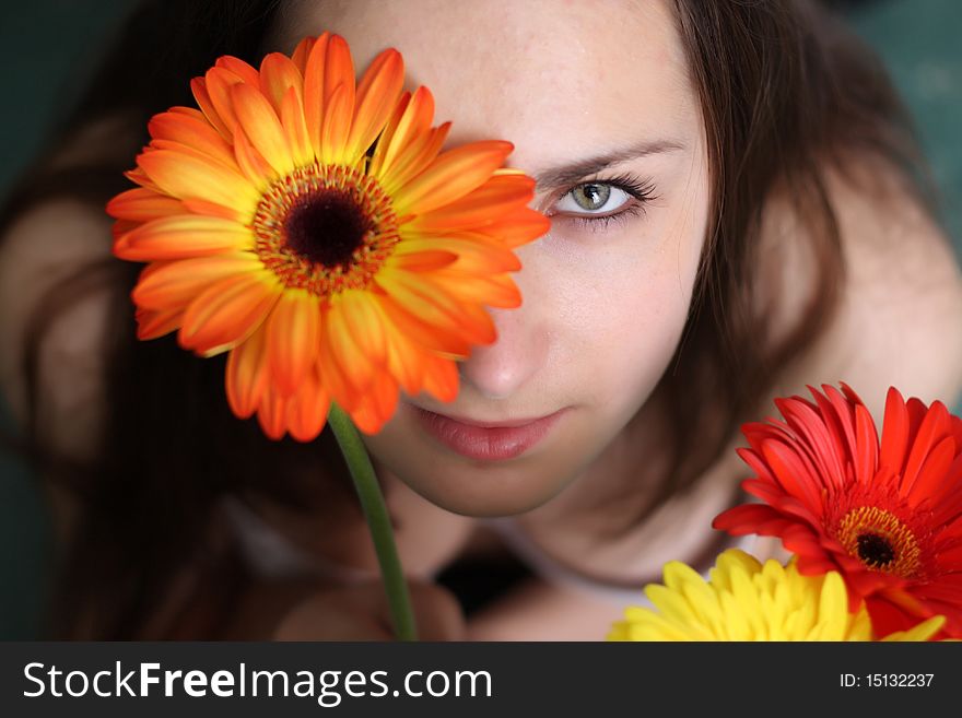 Beautiful girls with gerberas