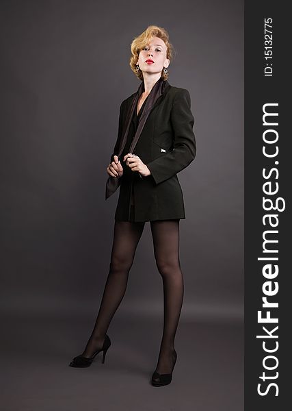 Beautiful young woman in a  business suit