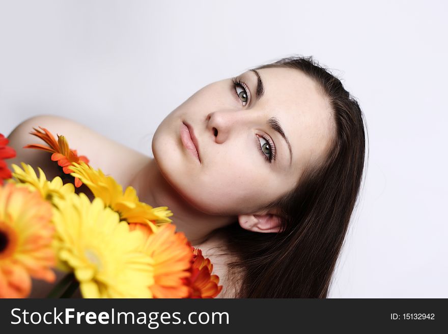 Beautiful girls with gerberas