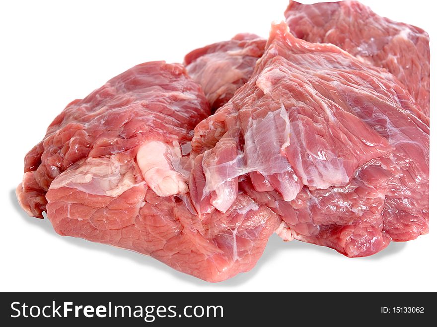 Pieces of fresh meat are isolated on a white background