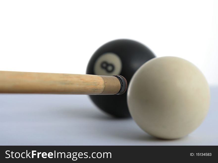 Wooden pool cue with white and black ball. Wooden pool cue with white and black ball