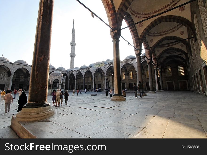 The exterior of Blue Mosque (Sultanahmet). People wandering. The exterior of Blue Mosque (Sultanahmet). People wandering.