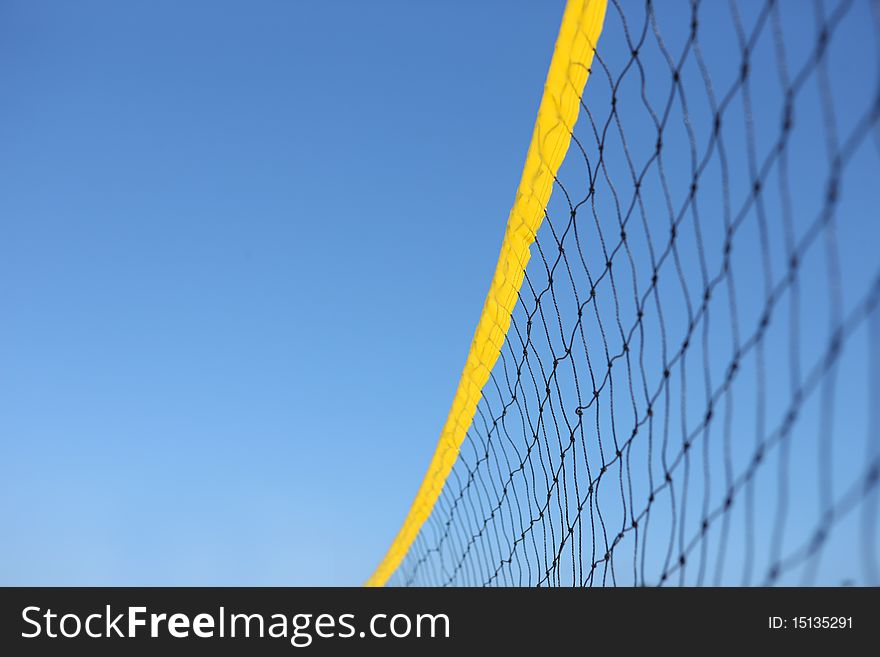Detail of beach volley net wit a blue sky