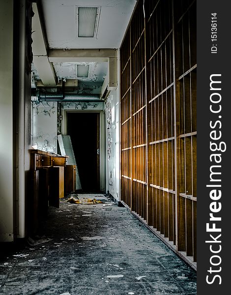 Image of an old derelict abandoned building with destroyed shelving and rotting walls. Image of an old derelict abandoned building with destroyed shelving and rotting walls.