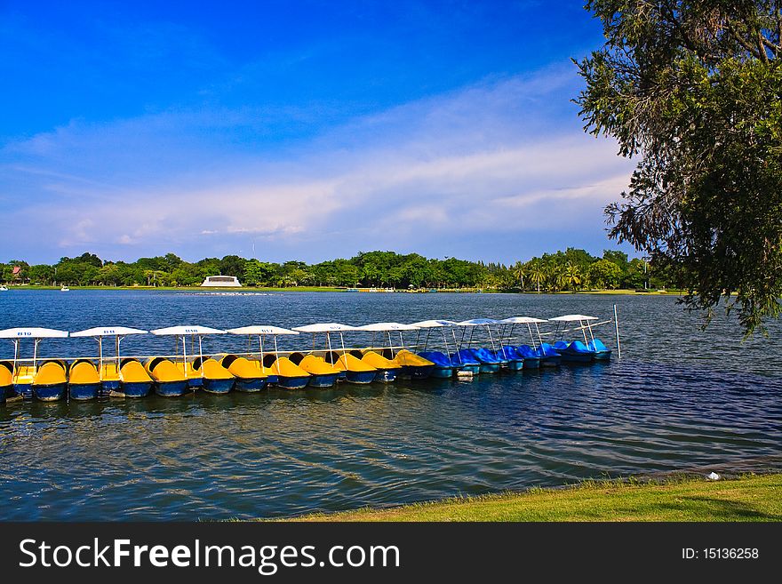 Colorful pedal boat for rent in lake. Colorful pedal boat for rent in lake