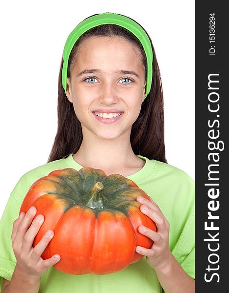 Happy girl in Halloween with a big pumpkin isolated on white background