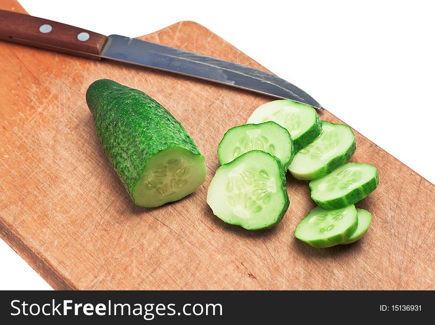 Chopped cucumber on cutting board