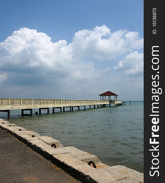 Waterfront jetty in the afternoon sky. Waterfront jetty in the afternoon sky