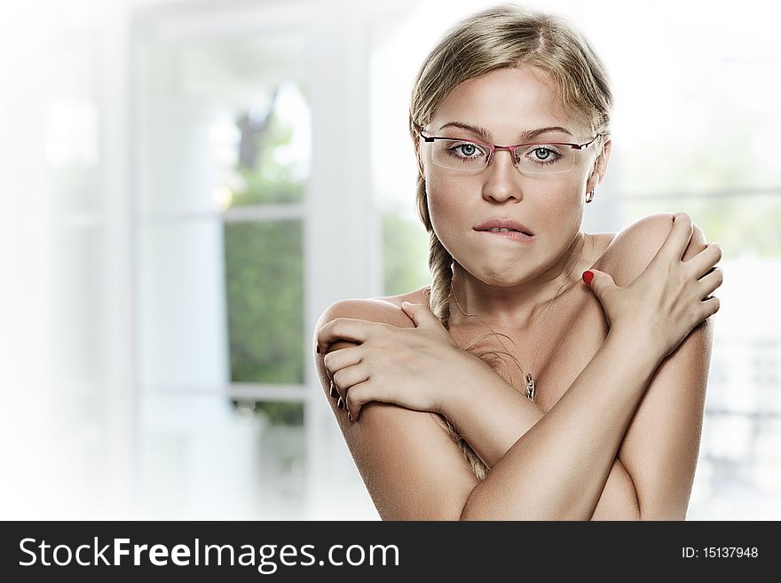 Portrait of young beautiful girl on color back