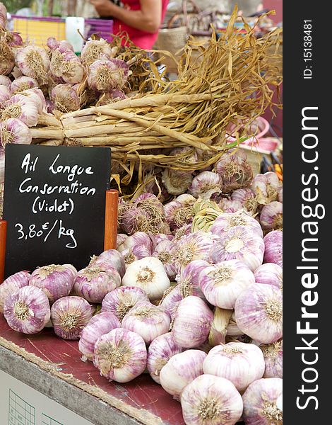 Bunches of Garlic on a market stall in France