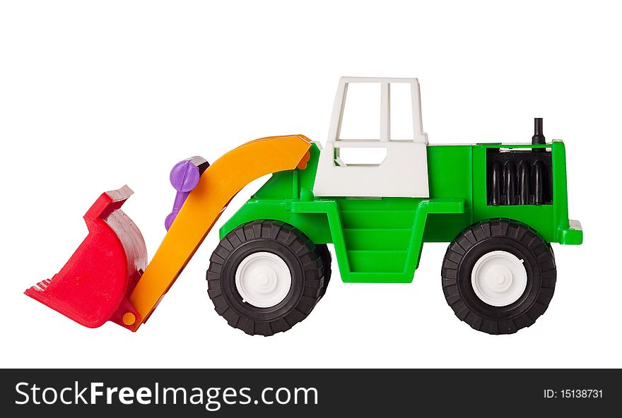 Toy excavator is isolated on a white background, side view. Toy excavator is isolated on a white background, side view