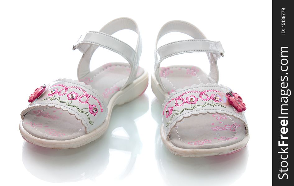 Children's barefoot persons, on a white background, it is isolated. Children's barefoot persons, on a white background, it is isolated.