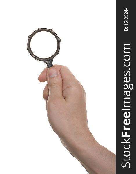 Well shaped hand with a magnifying glass isolated over white