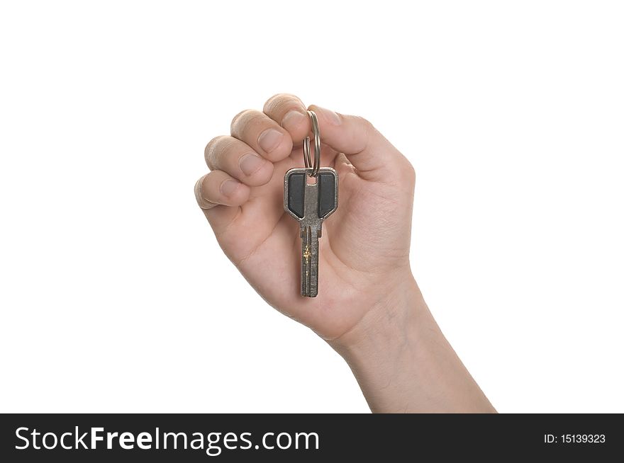 Business man hand with a key isolated over white