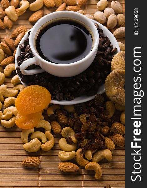 Coffee with nuts, fig and dried apricots