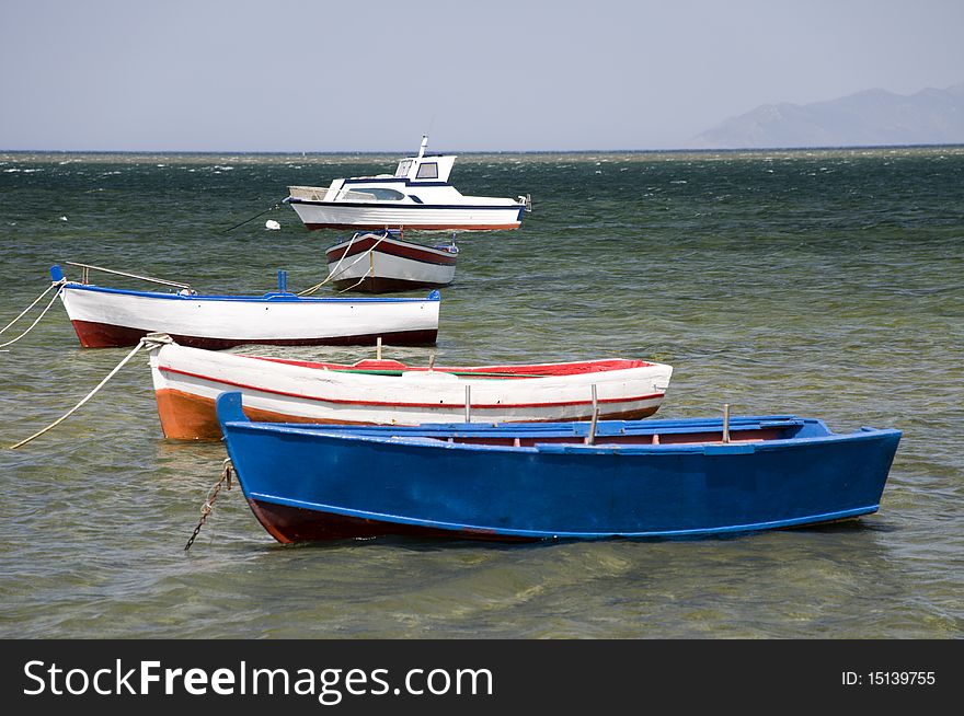 Five boats in the port, Marsala, Sicily, Italy