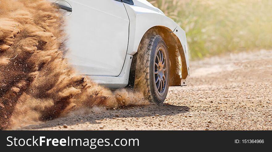 Close up rally racing car on dirt track