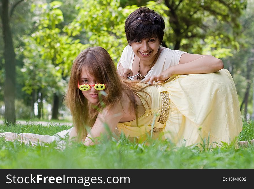 Two young girls having fun outdoors