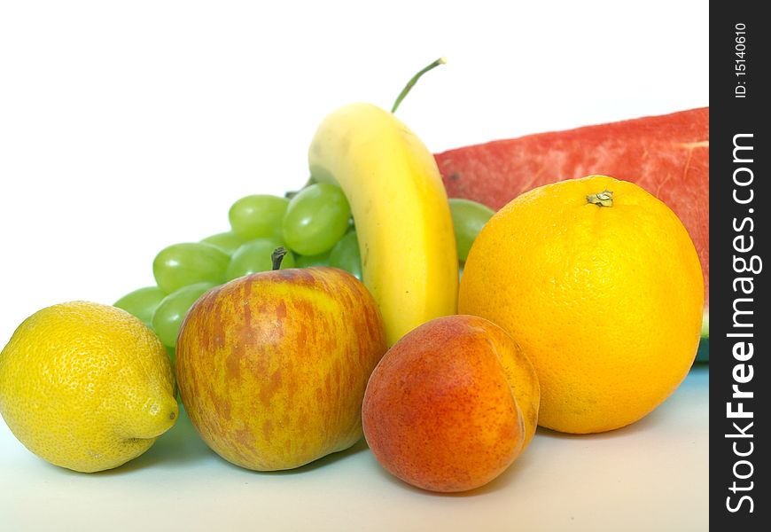 Various fruits on white background
