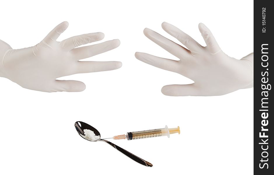 Hands of the person in surgical gloves, syringe, spoon with a white powder isolated on a white background. Hands of the person in surgical gloves, syringe, spoon with a white powder isolated on a white background