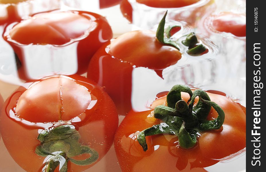 Close-up of fresh tomatoes in water