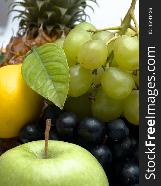 Group of different fruits isolated on white