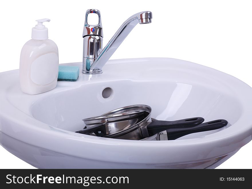 Wash dirty dishes in a white Sink. White background