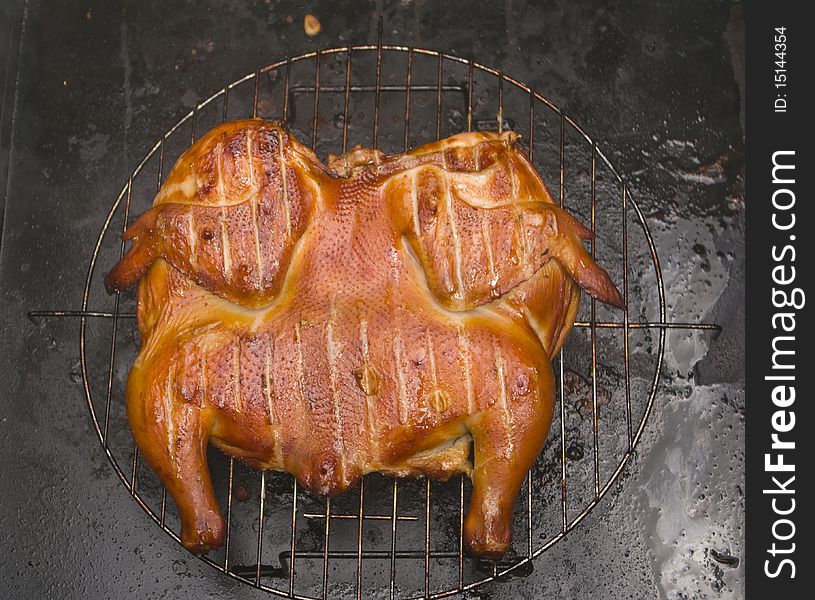 Chicken  grill on lattice in black background