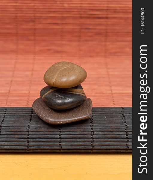 Stacked Stones on Bamboo Place Mats