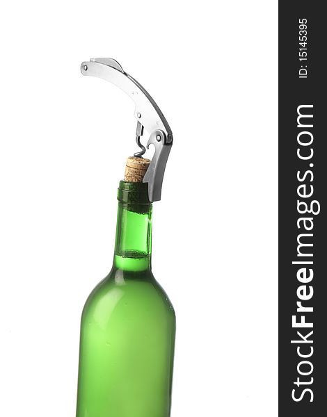 Opening a white wine bottle with a corkscrew. Opening a white wine bottle with a corkscrew