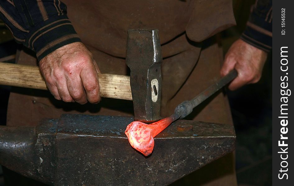 Hands of the working smith. Hands of the working smith